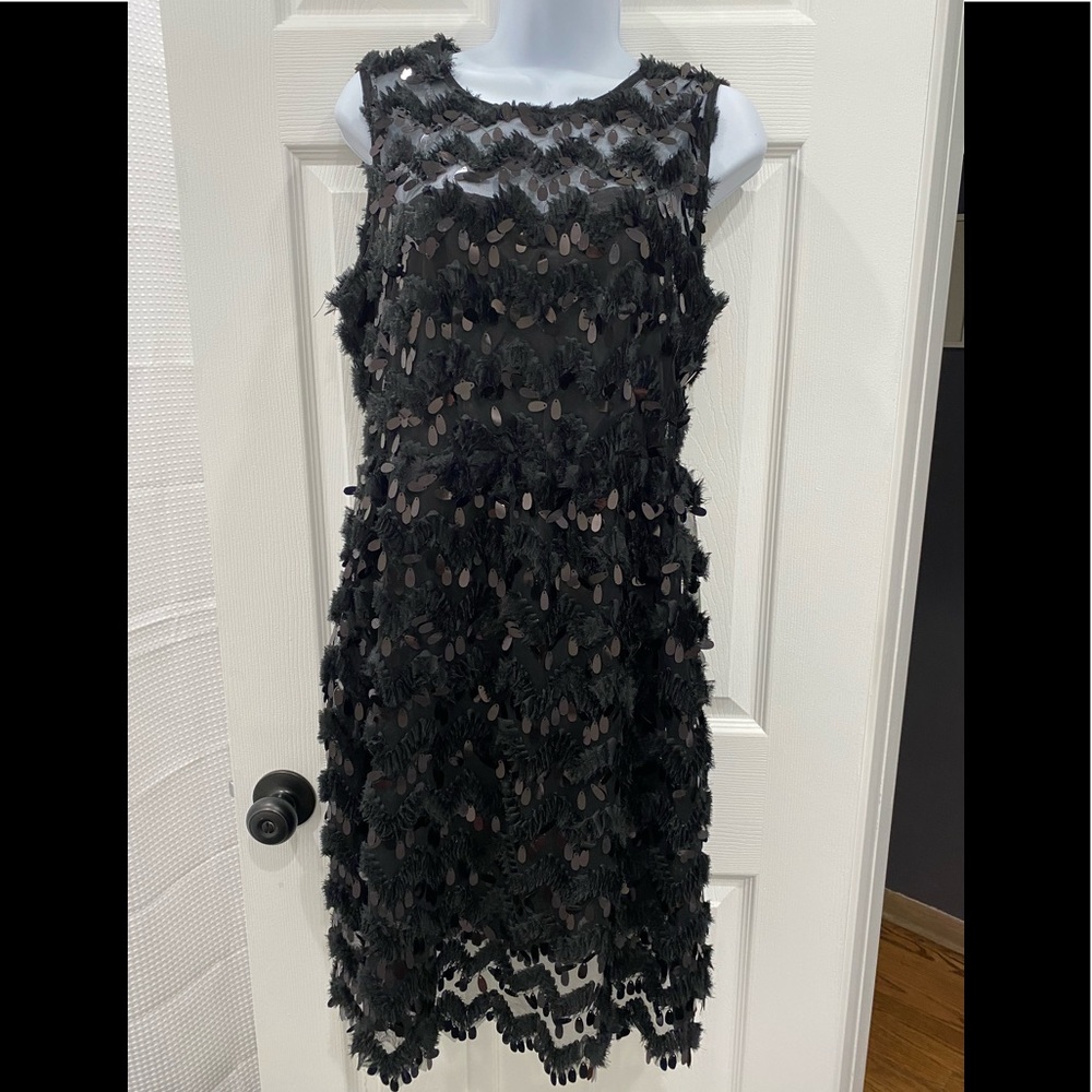 Beautiful dress from Anthropologie . The brand is Blue Taswel.